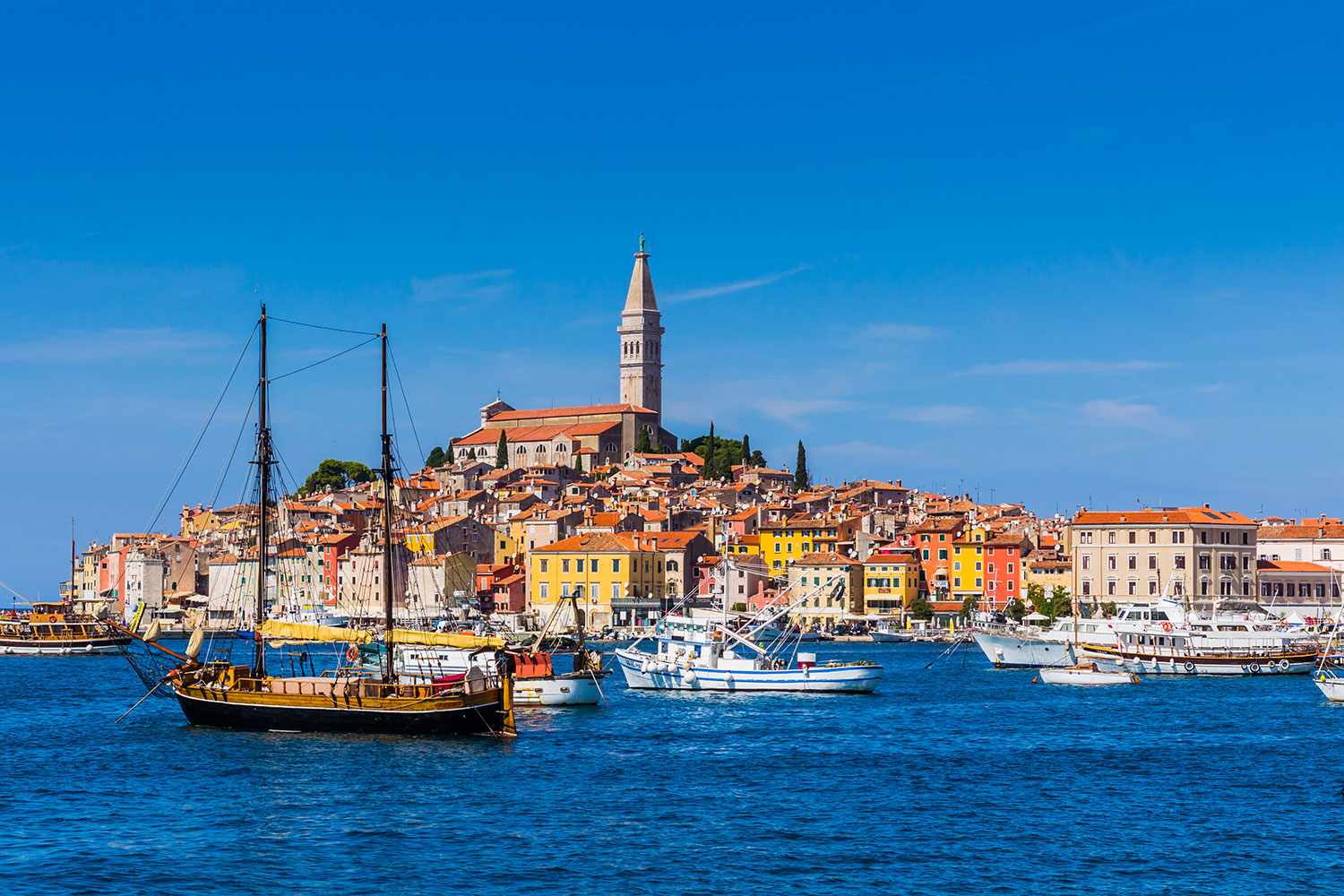 Boats anchored in front of the typical Istrian town