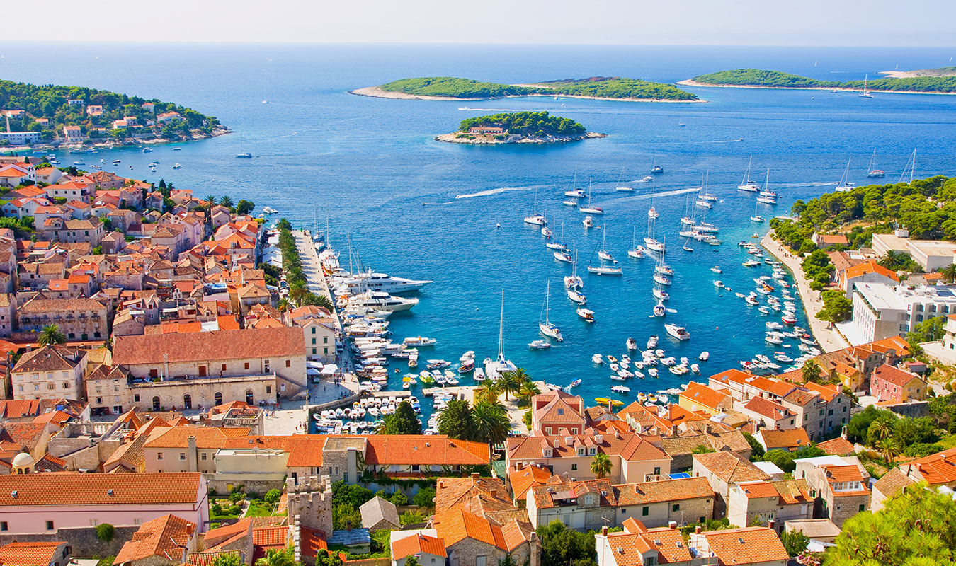 view from Hvar fortress to the boats anchored in the port and Pakleni islands in the back