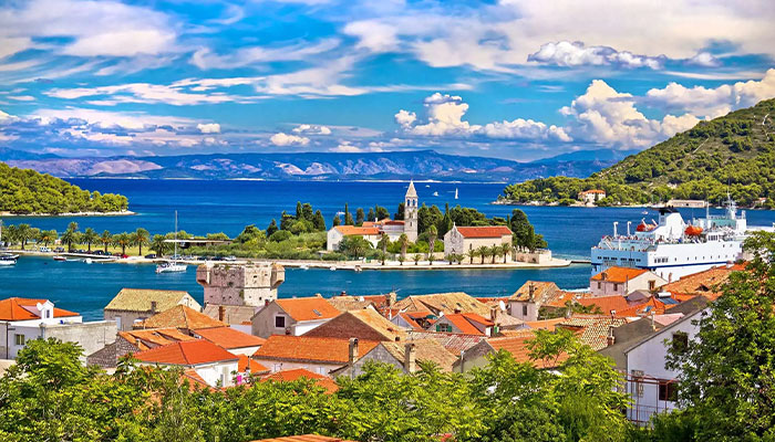 entrance bay to Vis town with house roofs