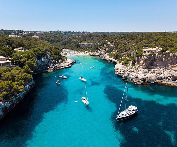 boats anchored in a beautiful bay in Spain
