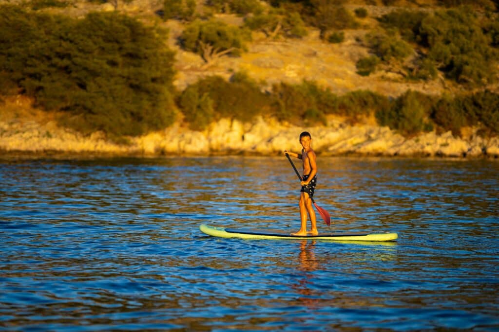 kid on a paddleboard