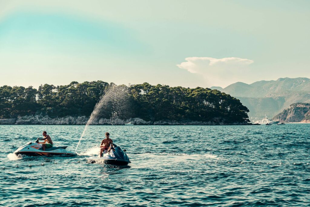 people on jet ski on a sunny day